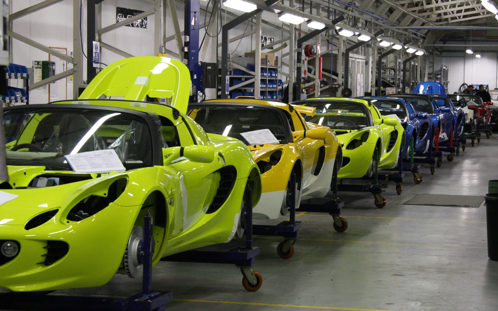 Manufacturing assembly line with automotive production equipment and structures